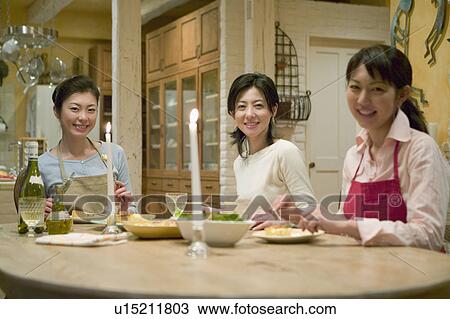 Three Mid Adult Women Eating a Meal View Large Photo Image Stock Image - Three Mid Adult Women Eating a Meal. Fotosearch