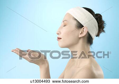 Mid Adult Woman Sniffing View Large Photo Image Stock Image - Mid Adult Woman Sniffing. Fotosearch