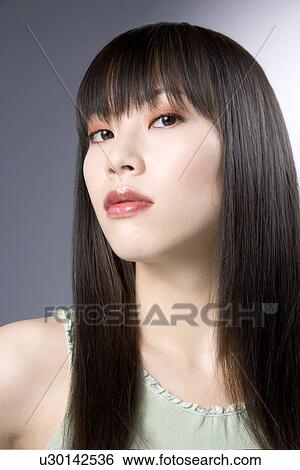 Young Woman Looking at Camera View Large Photo Image Stock Photograph - Young Woman Looking at Camera. Fotosearch