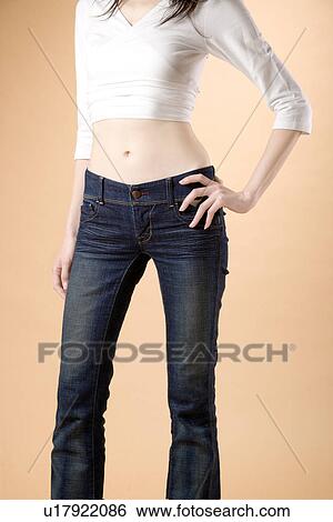 Young Woman Standing, Mid Section View Large Photo Image Stock Photograph - Young Woman Standing, Mid Section. Fotosearch