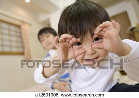 Boy making a funny face View Large Photo Image Stock Photograph - Boy making a funny face. Fotosearch