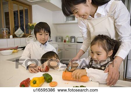 Children helping to cook View Large Photo Image Stock Photograph - Children helping to cook. Fotosearch