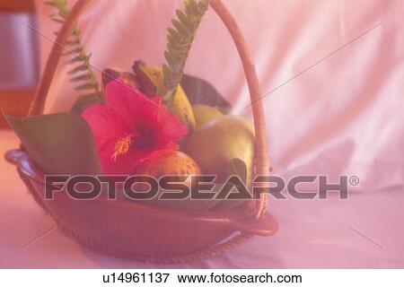 Stock Photo - Closed Up Image of a Fruit Basket on the Bed, Soft Focus, . Fotosearch