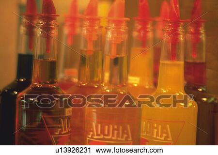Stock Image - Closed Up Image of Drink Bottles, Side View, Differential Focus. Fotosearch