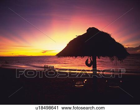 Stock Image - Sunset Tropical Beach, Pan Focus. Fotosearch