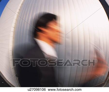 Businessman, Side View, Long Exposure, Fish Eye View Large Photo Image Stock Photograph - Businessman, Side View, Long Exposure, Fish Eye. Fotosearch