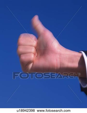 Thumb up in th air, Close Up, Low Angle View, Long Exposure View Large Photo Image Stock Photo - Thumb up in th air, Close Up, Low Angle View, Long Exposure. Fotosearch