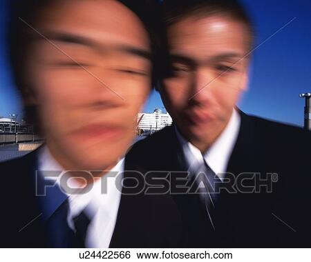 Two Businessmen, Front View, Long Exposure View Large Photo Image Stock Photograph - Two Businessmen, Front View, Long Exposure. Fotosearch