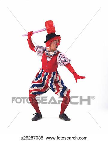 Stock Photo - Portrait of Clown Gesturing, Hitting His Head, Front View. Fotosearch