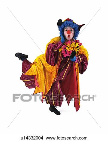 Portrait of Clown Gesturing, Holding Flowers, Front View View Large Photo Image Picture - Portrait of Clown Gesturing, Holding Flowers, Front View. Fotosearch