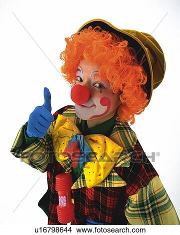 Picture - Portrait of Clown Posing, Holding Thumb Up, Front View . Fotosearch