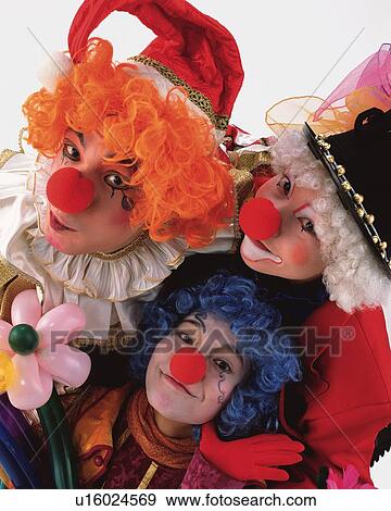 Stock Photo - Portrait of Clowns Gesturing, High Angle View . Fotosearch