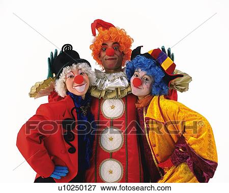 Stock Photo - Portrait of Clowns Posing, Front View. Fotosearch