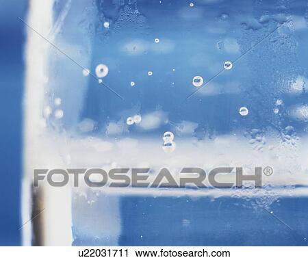 Stock Image - Dew on the Surface of Glass, Close Up, Differential Focus, In Focus, Out Focus, . Fotosearch