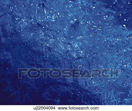 Surface of Water, High Angle View, Full Flame, Close Up, Differential Focus, In Focus, Out Focus, Toned Image View Large Photo Image Picture - Surface of Water, High Angle View, Full Flame, Close Up, Differential Focus, In Focus, Out Focus, Toned Image. Fotosearch