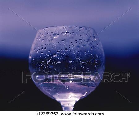 Stock Image - Wet Glass, Low Angle View, Close Up, Differential Focus, In Focus, Out Focus. Fotosearch
