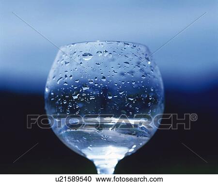 Stock Image - Wet Glass, Low Angle View, Close Up, Differential Focus, In Focus, Out Focus. Fotosearch