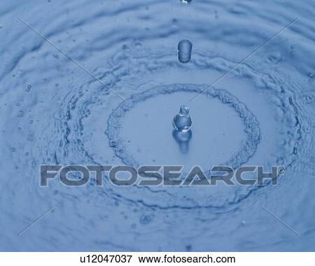 Stock Photo - Ripples of Water, Close Up, High Angle View, Differential Focus, In Focus, Out Focus, Toned Image. Fotosearch
