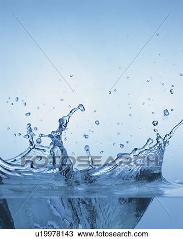 Stock Image - Splashed Water Surface, Close Up, Side View, Differential Focus, In Focus, Out Focus, . Fotosearch