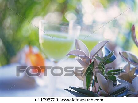 Stock Image - Drink in Glass, Low Angle View, Close Up, Differential Focus, In Focus, Out Focus. Fotosearch