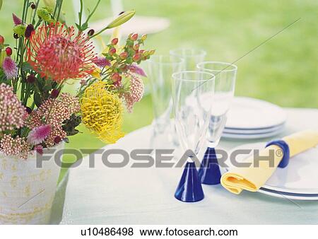Stock Photo - Table Setting in Garden, High Angle View, Close Up, Differential Focus, In Focus, Out Focus. Fotosearch
