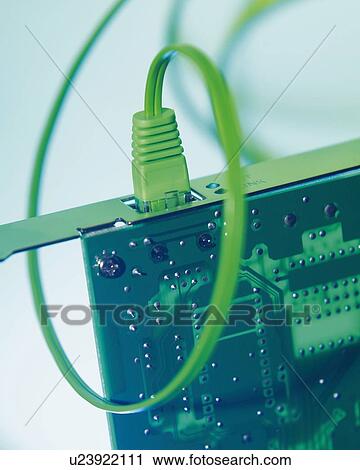 Stock Image - Cable and Printed Board, Close Up, Differential Focus, In Focus, Out Focus, Toned Image. Fotosearch