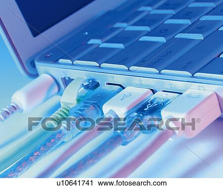 Stock Image - Cables Connected to Computer, Close Up, Toned Image. Fotosearch