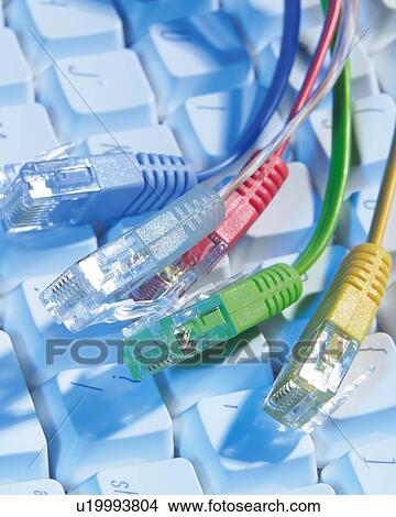 Picture - Colorful Cables on Keyboard, High Angle View, Close Up. Fotosearch
