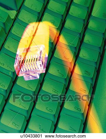 Stock Image - Composite Photograph of Keyboard and Cable, Close Up, Differential Focus, In Focus, Out Focus, Toned Image, Composition,. Fotosearch