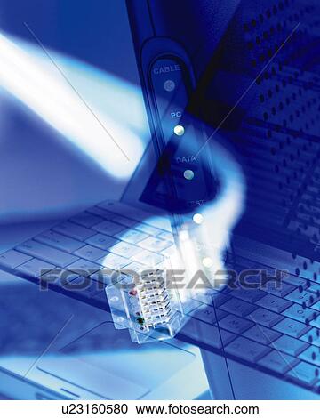 Stock Image - Composite Photograph of Modem and Cable and Notebook Computer, Composition, Close Up, Differential Focus, In Focus, Out Focus, Toned Image. Fotosearch