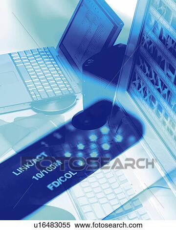 Stock Photography - Composite Photograph of Notebook Computer and Hub, High Angle View, Composition, Toned Image. Fotosearch