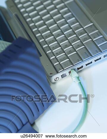 Computer and Modem on a Desk, Close Up, Differential Focus, In Focus, Out Focus View Large Photo Image Stock Photo - Computer and Modem on a Desk, Close Up, Differential Focus, In Focus, Out Focus. Fotosearch