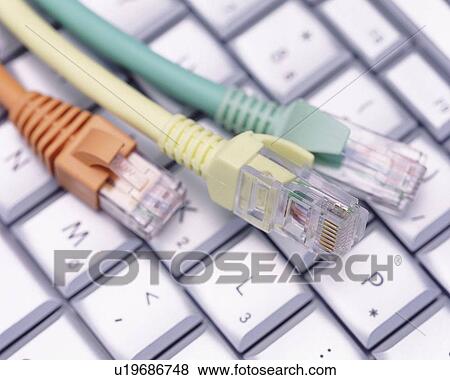 Stock Photo - Keyboard and Colorful Cables, Close Up, High Angle View, Differential Focus, In Focus, Out Focus,. Fotosearch