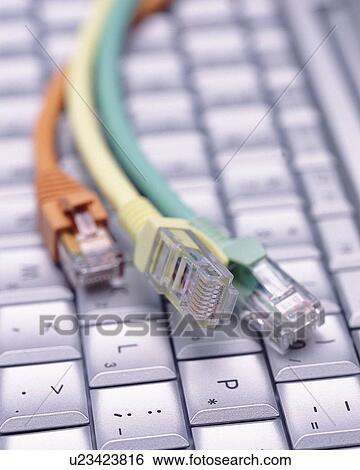 Stock Photograph - Keyboard and Colorful Cables, Close Up, Differential Focus, In Focus, Out Focus,. Fotosearch