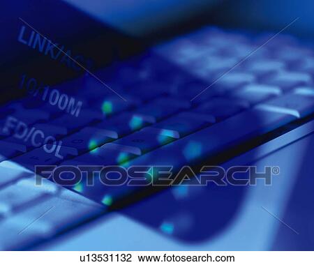Stock Image - Keyboard in the Dark Room, Close Up, Composition, Differential Focus, In Focus, Out Focus, Toned Image. Fotosearch
