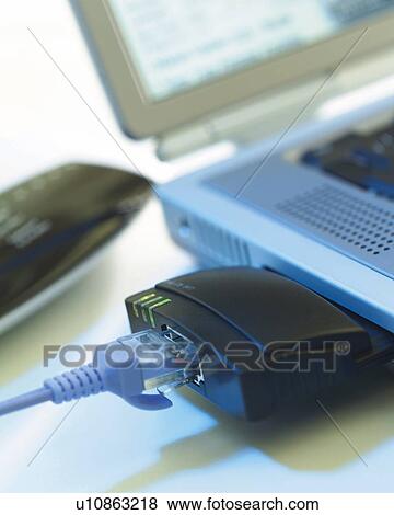 Notebook Computer and Peripheral Device on Desk, Close Up, Differential Focus, In Focus, Out Focus View Large Photo Image Stock Photo - Notebook Computer and Peripheral Device on Desk, Close Up, Differential Focus, In Focus, Out Focus. Fotosearch