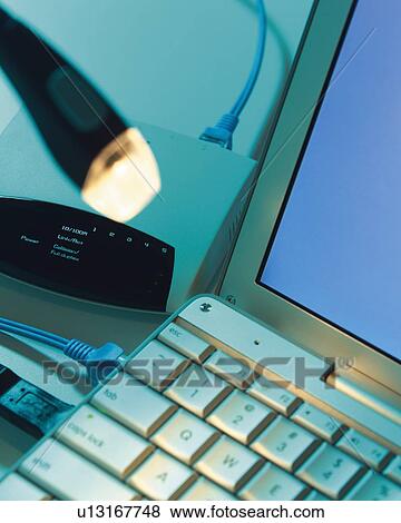 Notebook Computer and Peripheral on a Desk, High Angle View, Differential Focus, In Focus, Out Focus, View Large Photo Image Stock Photo - Notebook Computer and Peripheral on a Desk, High Angle View, Differential Focus, In Focus, Out Focus,. Fotosearch