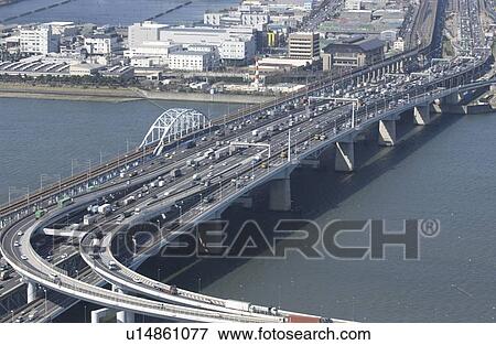 Stock Photo - Arakawa Bay Bridge, Aerial View, Pan Focus. Fotosearch