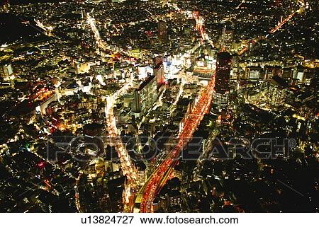Stock Photo - Night View of Shibuya Station Area, Aerial View, Long Exposure. Fotosearch