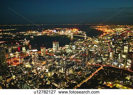 Stock Photo - Night View of Tokyo Port Area, Aerial View, Long Exposure. Fotosearch