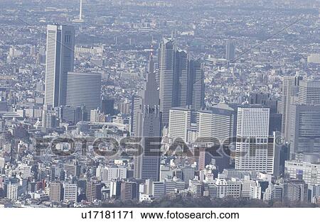 Stock Image - The Skyscrapers of Nishishinjuku, Aerial View, Pan Focus. Fotosearch