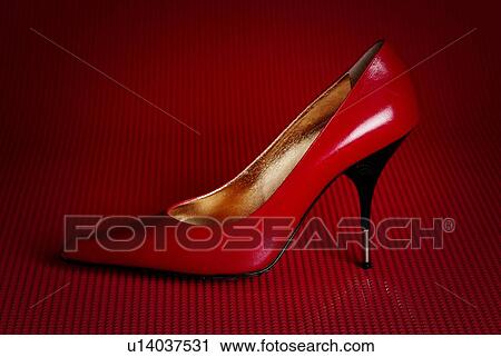 Stock Image - Red High Heeled Shoe, Side View, Copy Space. Fotosearch