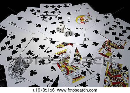 Stock Photograph - Two Dices and Cards, High Angle View. Fotosearch