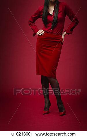 Stock Image - Woman in Red, Front View. Fotosearch