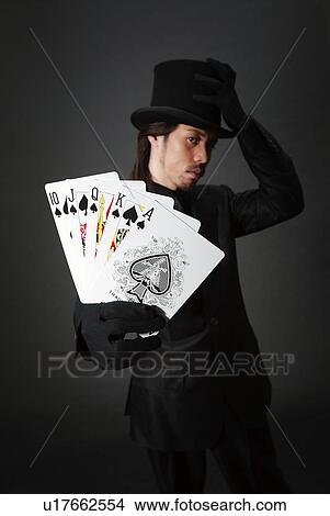 Young Man in Black and Cards, Front View View Large Photo Image Picture - Young Man in Black and Cards, Front View. Fotosearch