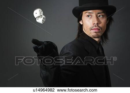 Young Man in Black and Two Dices, Side View View Large Photo Image Stock Image - Young Man in Black and Two Dices, Side View. Fotosearch
