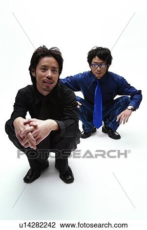 Young Men in Blue and in Black, High Angle View View Large Photo Image Stock Image - Young Men in Blue and in Black, High Angle View. Fotosearch