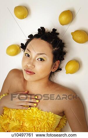 Young Woman and Lemons, High Angle View View Large Photo Image Stock Image - Young Woman and Lemons, High Angle View. Fotosearch