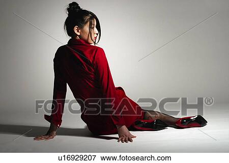Young Woman in Red Sitting Down, Rear View View Large Photo Image Stock Photo - Young Woman in Red Sitting Down, Rear View. Fotosearch