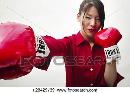 Young Woman in Red Wearing Gloves, Front View View Large Photo Image Stock Photo - Young Woman in Red Wearing Gloves, Front View. Fotosearch